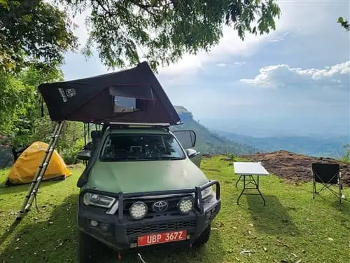 Camping with the Toyota Hilux Overland truck at Sipi Falls in Uganda.