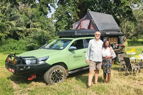 Team of Meanda Uganda in front of the Hilux Overland Camping truck.